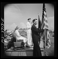 Greenbelt, Maryland. Dr. McCarl, Greenbelt dentist, as chairman of the American Legion committee for the Memorial Day ceremonies, opening the program. Sourced from the Library of Congress.