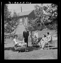[Untitled photo, possibly related to: Washington, D.C. The Icelandic legation. Minister Thors joins his office staff in a brief respite on the lawn outside the chancery. Left to right: Martha Thors, Thor Thors, Asgen Asgenson, Miss Elliot, Bjornsson]. Sourced from the Library of Congress.