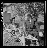 [Untitled photo, possibly related to: Washington, D.C. Mr. and Mrs. Thor Thors relaxing in their garden behind the legation]. Sourced from the Library of Congress.