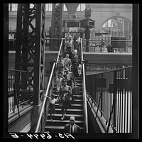 [Untitled photo, possibly related to: New York, New York. Stairway from concourse to trains at the Pennsylvania railroad station]. Sourced from the Library of Congress.