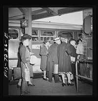 [Untitled photo, possibly related to: New York, New York. Boarding interstate buses at the Greyhound bus terminal, 34th Street]. Sourced from the Library of Congress.