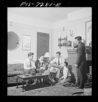 [Untitled photo, possibly related to: New York, New York. Mr. Fing, a Chinese-American merchant, and his wife in their Flatbush home. Notice the rubber tire ashtrays]. Sourced from the Library of Congress.