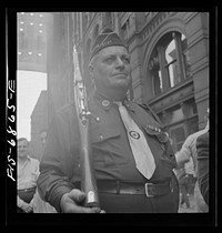 [Untitled photo, possibly related to: New York, New York. Italian-American Legionnaries marching in a parade on Mott Street, at the Feast of San Rocco (August 16) which ended in a flag raising ceremony in honor of the boys of the neighborhood who were in the United States Army]. Sourced from the Library of Congress.