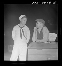 [Untitled photo, possibly related to: New York, New York. Czechoslovakian Jew encountered at Astor Place about midnight. He has been in American since 1905, has been on relief eight years; spends all spare time collecting scrap for defense; picked up paper because he cannot afford to buy one. However, he keeps up with the times; was out for a stroll after listening to the radio all evening. He is talking with a sailor from Texas who happened by]. Sourced from the Library of Congress.