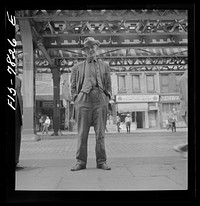 New York, New York. Bum who claimed to be Scotch comedian, at Third Avenue and 14th Street. Sourced from the Library of Congress.