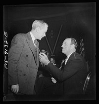 New York, New York. Marine and shipbuilding workers' convention. A friendly word between President Green, and Curran, President of the Maritime Union who was guest speaker. Sourced from the Library of Congress.