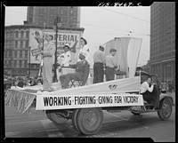 Detroit, Michigan. Float in the Labor Day parade showing relationship between the Army, Red Cross and industrial workers. Sourced from the Library of Congress.
