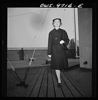 [Untitled photo, possibly related to: New York, New York. Powers Agency model ina WAVE's (Women Auxiliary Volunteer Emergency Service) uniform overcoat]. Sourced from the Library of Congress.