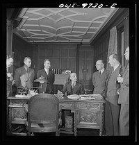 [Untitled photo, possibly related to: Washington, D.C. The Turkish Embassy. Ambassador Ertrogren [i.e., Ertegun] and his staff in his office]. Sourced from the Library of Congress.