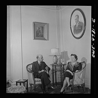 Washington, D.C. The Turkish Embassy. Ambassador and Madame Ertrogren [i.e., Ertegun] in the embassy living room. Photograph of Mustapha Kemal above Madame's head. Sourced from the Library of Congress.