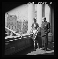 Washington, D.C. The Egyptian Legation on Massachusetts Avenue. Minister and Madame Hassan with their daughter on the legation balcony. Sourced from the Library of Congress.