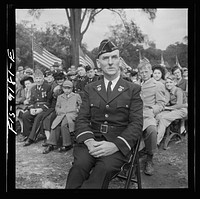 Detroit (vicinity), Michigan. Ceremonies at the presentation of the Army and Navy E award to the Briggs manufacturing company. Worker who is a war veteran. Sourced from the Library of Congress.