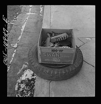 Lititz, Pennsylvania. Scrap colletion drive. Each household placed its contribution on the sidewalk. It was then picked up by local trucks whose owners had volunteered their services for civilian defense. Sourced from the Library of Congress.