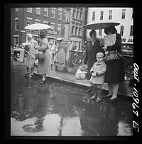 Lancaster, Pennsylvania. Waiting for buses on a rainy market day. Sourced from the Library of Congress.