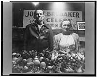 Farmer and his wife at her stall in Central Market. Lancaster, Pennsylvania. Sourced from the Library of Congress.