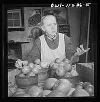 Lititz, Pennsylvania. Mennonite farmer's wife at the farmers' market. Sourced from the Library of Congress.
