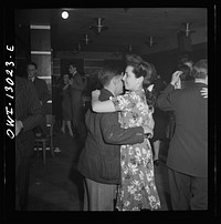 [Untitled photo, possibly related to: New York, New York. Merchant seamen's Christmas party at the Andrew Feruseth Club on Christmas Day. Dancing with hostesses]. Sourced from the Library of Congress.