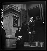 New York, New York. Italian-Americans leaving the church of Our Lady of Pompeii at Bleeker and Carmine Streets, on New Year's Day. Sourced from the Library of Congress.