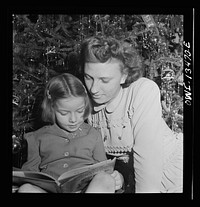 New York, New York. Martinetti grandchild and her aunt at the Christmas tree. The pin indicates that her uncle is in the United States Army. Sourced from the Library of Congress.
