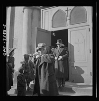 [Untitled photo, possibly related to: New York, New York. Italians coming out of Saint Patrick's Church on Mott Street on Sunday]. Sourced from the Library of Congress.