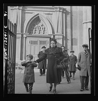New York, New York. Italians coming out of Saint Patrick's Church on Mott Street on Sunday. Sourced from the Library of Congress.