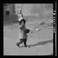 New York, New York. Child on Mott Street on Sunday. Sourced from the Library of Congress.
