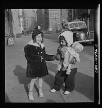 [Untitled photo, possibly related to: New York, New York. Child on Mott Street on Sunday]. Sourced from the Library of Congress.