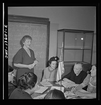 New York. New York. Class in citizenship and English for Italians given free of charge at the Hudson Park library on Seventh Avenue near Bleeker Street. Sourced from the Library of Congress.