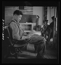 Ojo Sarco, New Mexico. One-room school in an isolated mountainous Spanish-American community, which has eight grades and two teachers. Most of the teaching is in Spanish, the language spoken in the children's homes, and as a result they rarely speak English fluently. Sourced from the Library of Congress.