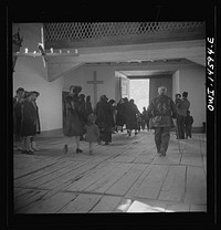 Trampas, New Mexico. People leaving the church after the service. Sourced from the Library of Congress.