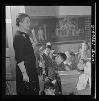 [New York, New York. Teacher and pupils in class at Public School Eight]. Sourced from the Library of Congress.
