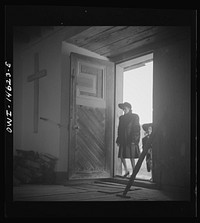 Trampas, New Mexico. Mass day at a church which was built in 1700 and is the best-preserved colonial mission in the Southwest. Sourced from the Library of Congress.