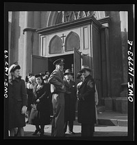 [Untitled photo, possibly related to: New York, New York. Italian-American leaving Saint Patrick's church on Mulberry Street on Sunday morning]. Sourced from the Library of Congress.