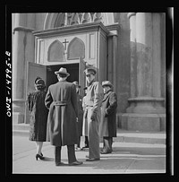 [Untitled photo, possibly related to: New York, New York. Italian-American leaving Saint Patrick's church on Mulberry Street on Sunday morning]. Sourced from the Library of Congress.