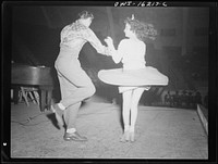 Detroit, Michigan. Jitterbug dancing as part of the entertainment at a scrap salvage rally sponsored by the Work Projects Adminstration (WPA) at the state fairgrounds. Sourced from the Library of Congress.