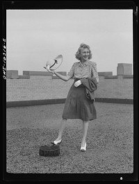 [Untitled photo, possibly related to: Detroit, Michigan. Fashion show presented by the Chrysler Girls' Club of the Chrysler Corporation at Saks Fifth Avenue store. Typical American girl]. Sourced from the Library of Congress.