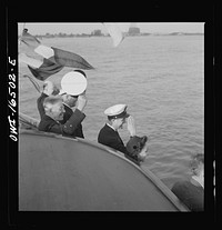 [Untitled photo, possibly related to: Detroit, Michigan. A Venetian night party at the Detroit yacht club, whose members represent the wealthier class of manufacturers and their friends. Reviewing the fleet]. Sourced from the Library of Congress.