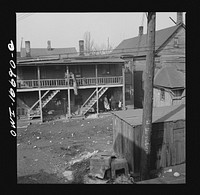 [Untitled photo, possibly related to: Detroit, Michigan. Typical  residence. These are conditions under which families originally lived before moving to the Sojourner Truth housing project]. Sourced from the Library of Congress.