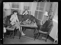 [Untitled photo, possibly related to: Detroit, Michigan. Girls playing cards and drinking coca cola]. Sourced from the Library of Congress.