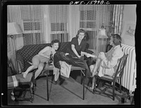 [Untitled photo, possibly related to: Detroit, Michigan. Girls playing cards and drinking coca cola]. Sourced from the Library of Congress.
