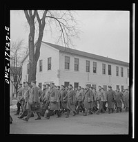 Carlisle, Pennsylvania. U.S. Army medical field service school. Army doctors walking to classes after lunch. These doctors are taken from civilian life for a five-week course in how the Army, and particularly the medical corps, functions before going into active service. Their ranks range from first lieutenant to major, depending on their age and experience, and on whether they were formerly reserve officers. Sourced from the Library of Congress.