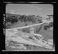 [Untitled photo, possibly related to: Trampas, Taos County, New Mexico. A Spanish-American village in the foothills of the Sangre de Cristo Mountains. Ditches and hand-hewn flumes carry the mountain water out over the valley for irrigation]. Sourced from the Library of Congress.