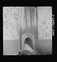 Trampas, Taos County, New Mexico. A deserted adobe in a Spanish-American village in the foothills of the Sangre de Cristo Mountains. This fireplace was used for cooking and heating. Sourced from the Library of Congress.