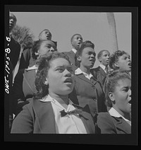 [Untitled photo, possibly related to: Daytona Beach, Florida. Bethune-Cookman College. Student choir singing on the campus]. Sourced from the Library of Congress.