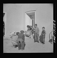 [Untitled photo, possibly related to: Trampas, New Mexico. The wife and daughter of Juan Lopez, the majordomo (mayor), doing the family washing]. Sourced from the Library of Congress.