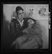 [Untitled photo, possibly related to: Penasco, Taos County, New Mexico. A Spanish-American mother at the clinic]. Sourced from the Library of Congress.