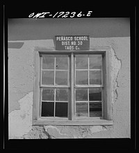 Penasco, Taos County, New Mexico. Former grade and high school, which is now deserted for larger quarters. Sourced from the Library of Congress.