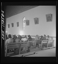 [Untitled photo, possibly related to: Penasco, Taos County, New Mexico. Mass in the village church]. Sourced from the Library of Congress.
