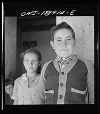 [Untitled photo, possibly related to: Los Cordovas (vicinity), Taos County, New Mexico. Sons of a Spanish-American sheepman]. Sourced from the Library of Congress.