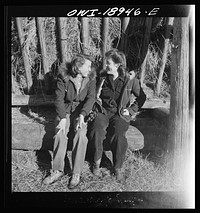 Moreno Valley, Colfax County, New Mexico. The Mutz girls talking in the home corral on George Mutz's farm. Sourced from the Library of Congress.